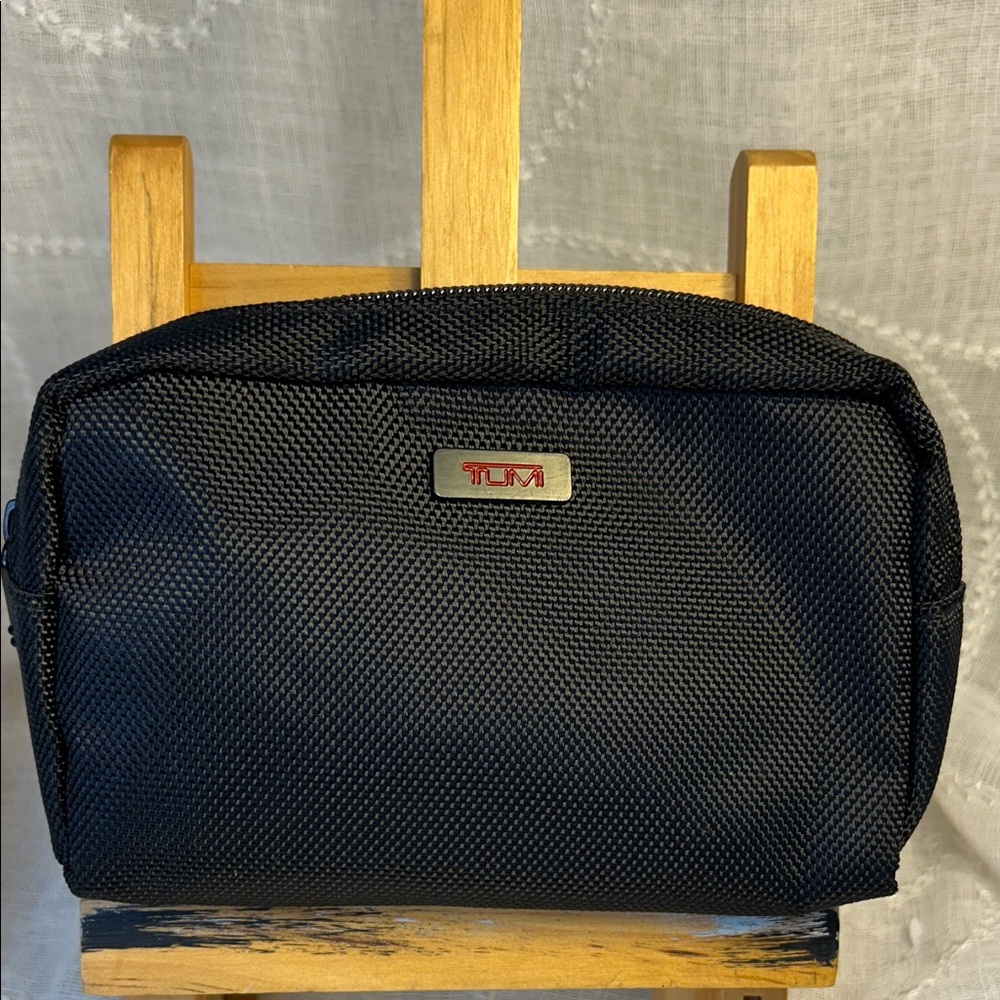 TUMI new never used cosmetic bag with some goodies
